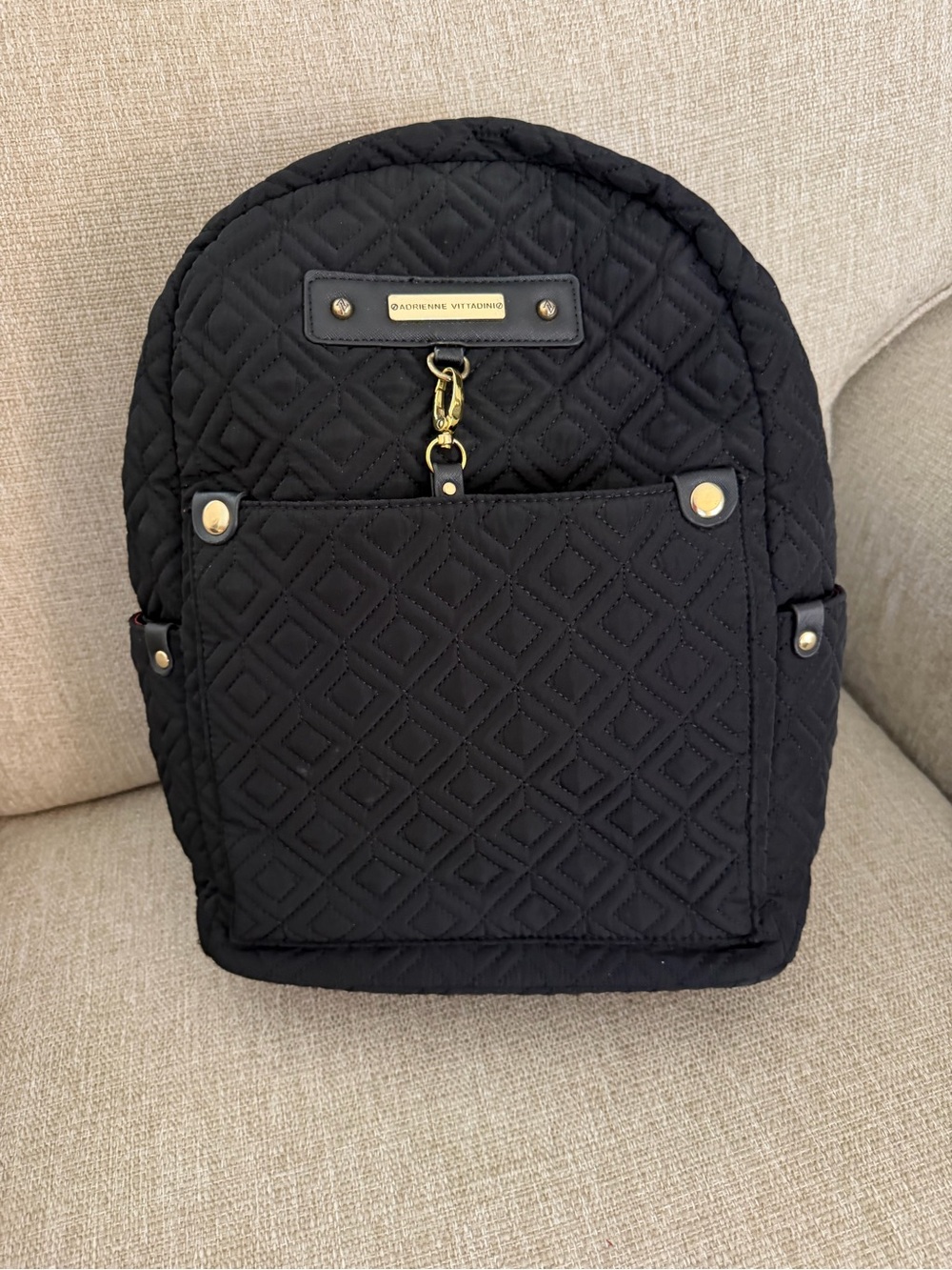 Adrienne Vitadini Black Quilted Backpack with Gold Hardware